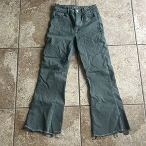 green flared jeans from american eagle